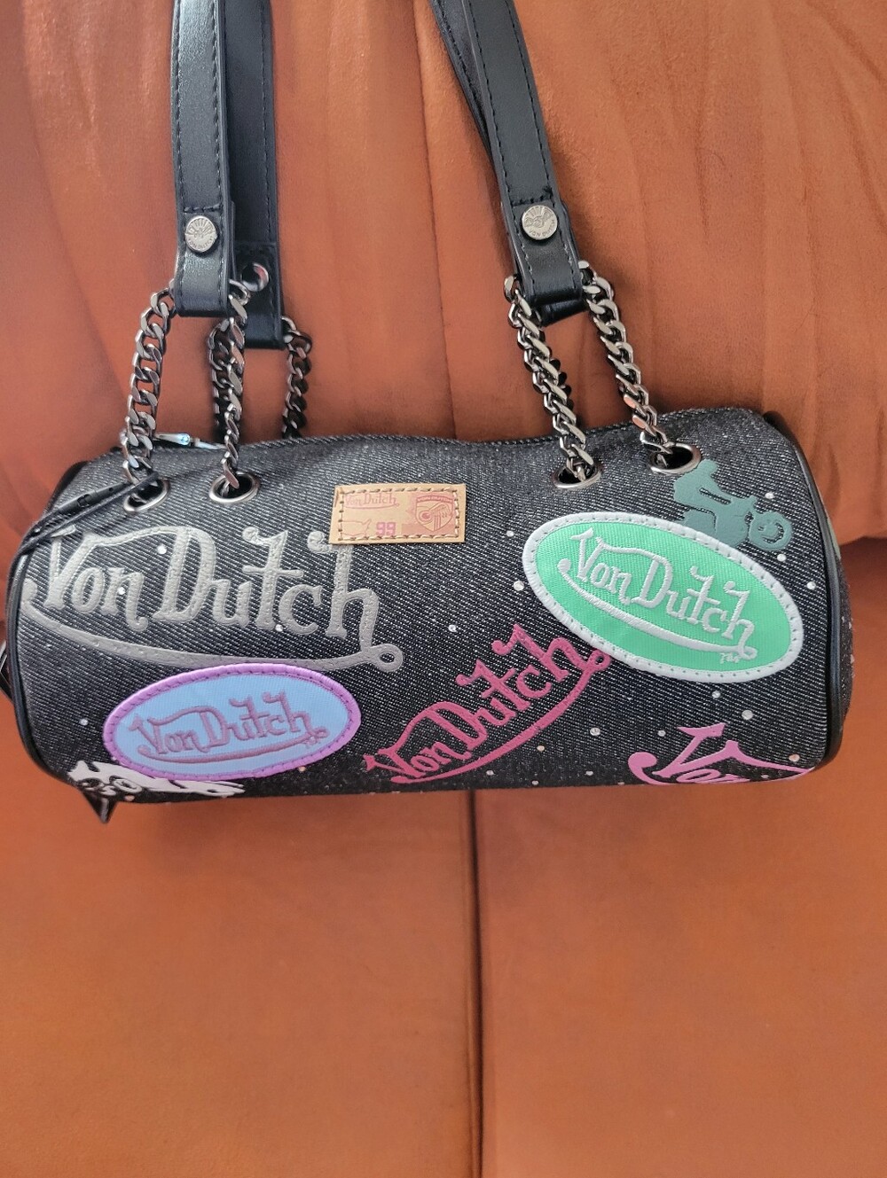 Von Dutch Black Mini Barrel Bag with Pastel Logo Patches